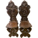 Pair of Heavily Carved 18th Century Oak Hall Chairs