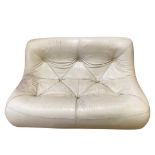 Ligne Roset leather two seater sofa (worn) together with matching foot stool (AF)