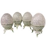 Four Swarovski Crystal Encrusted Platinum Coated Eggs. (4)
