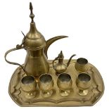 Brass Persian Ewer with Tray and 6 cups alongside a miniature Persian ewer