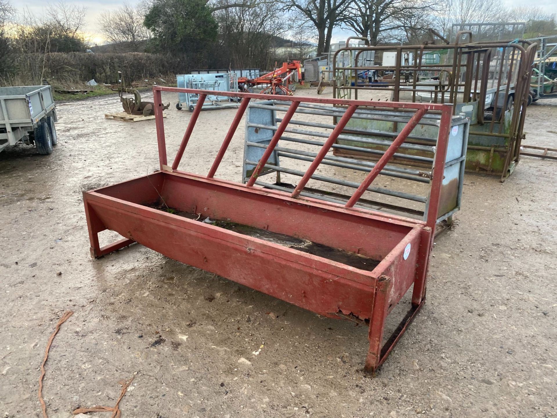 cattle feed trough and barrier