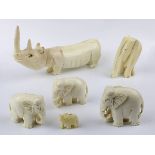 Konvolut 5 kleine Elefanten aus Elfenbein und 1 Nashorn aus Bein, Indien und Afrika 1. H. 20. Jh.,