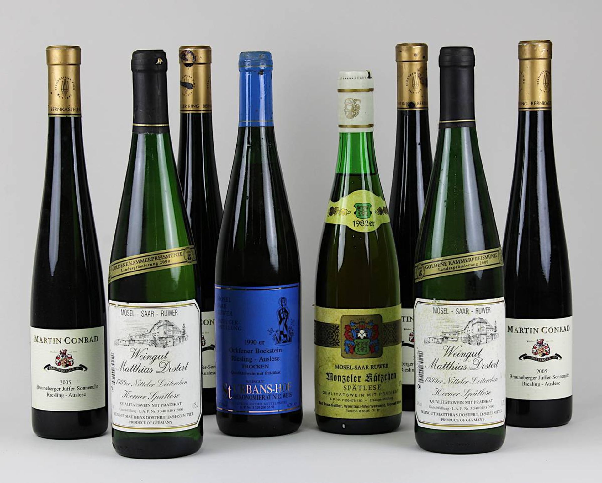 Acht Flaschen Weißwein: eine Flasche 1982er Monzeler Kätzchen, Mosel-Saar-Ruwer Spätlese, Karl