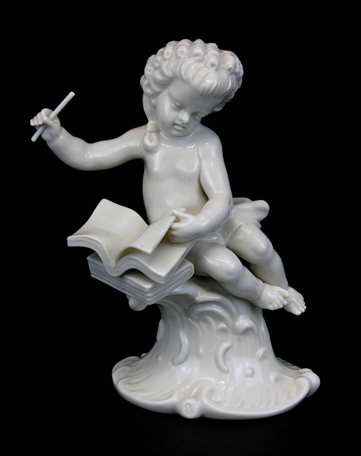 Putto als Dirigent, Nymphenburg 2.H. 20. Jh., Weißporzellan, Figur aus dem Puttenorchester von F. K.