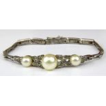 Art Déco Silberarmband mit Wachsperlen und Glasstrassbesatz, Deutschland um 1920, 925 gestempelt,