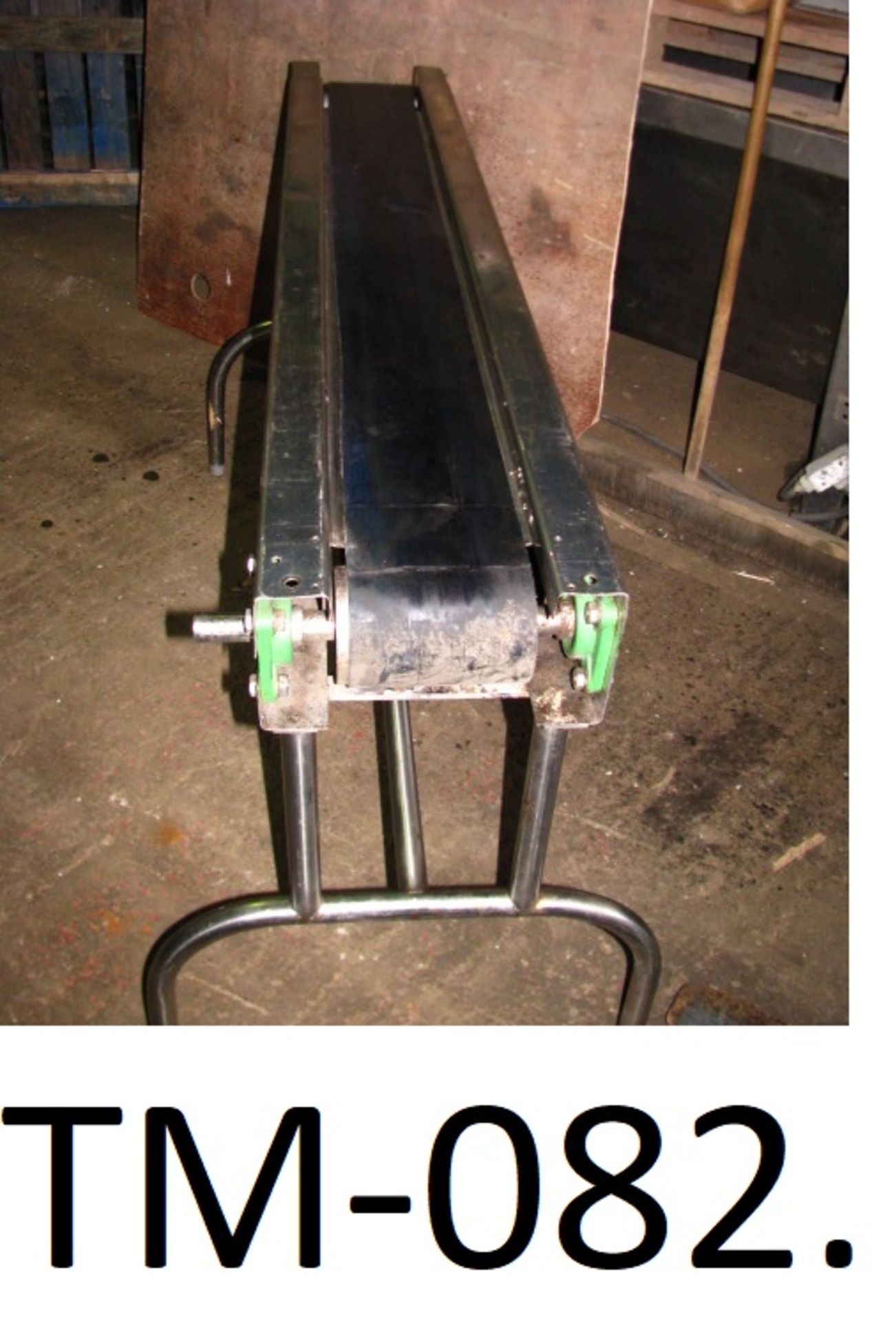 Stainless Steel Conveyor, with flat plastic 125mm wide belt, approx. 15m long and bare shaft, free