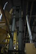 Carier BELT & BUCKET ELEVATOR, approx. 200mm wide on leg section, approx. 6m centres high, with