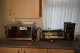 Microwave, with kettle, coffee machine and bread b