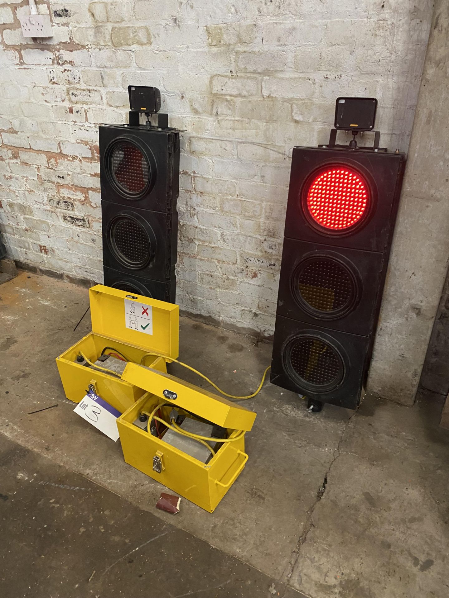 One Pair of Hollco Temporary Traffic Lights, with two battery packs (known to require antennas) (