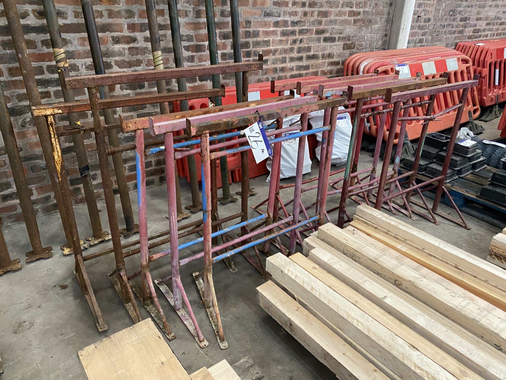 Ten Adjustable Height Steel Trestles (no vat on hammer price on this lot - however vat is payable on