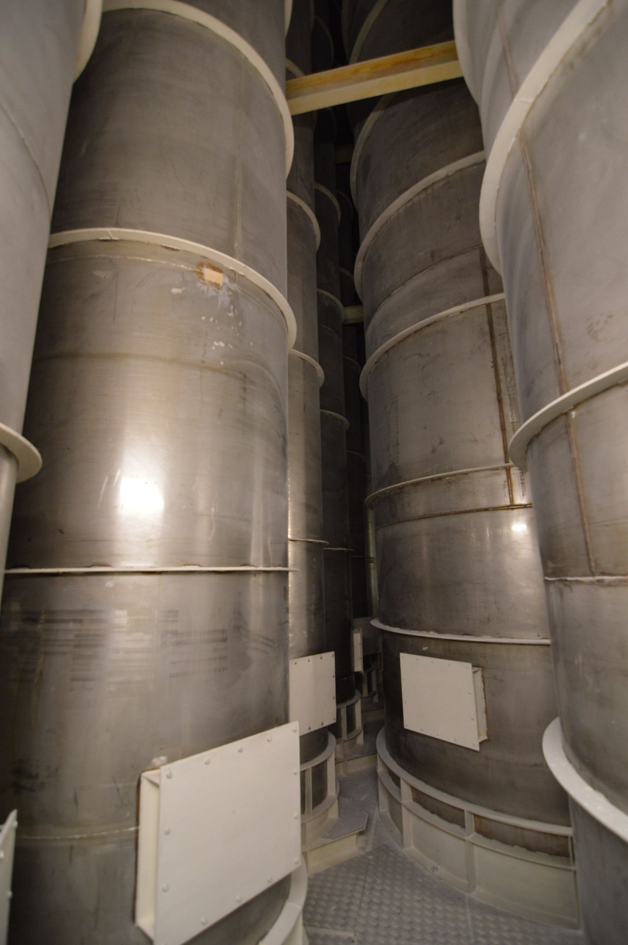 NEST OF NINE STAINLESS STEEL FLOUR STORAGE BINS, comprising two x 50 tonne cap., one x 25 tonne