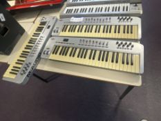 Three Oxygen 49 M-Audio Electric Keyboards (Room 6