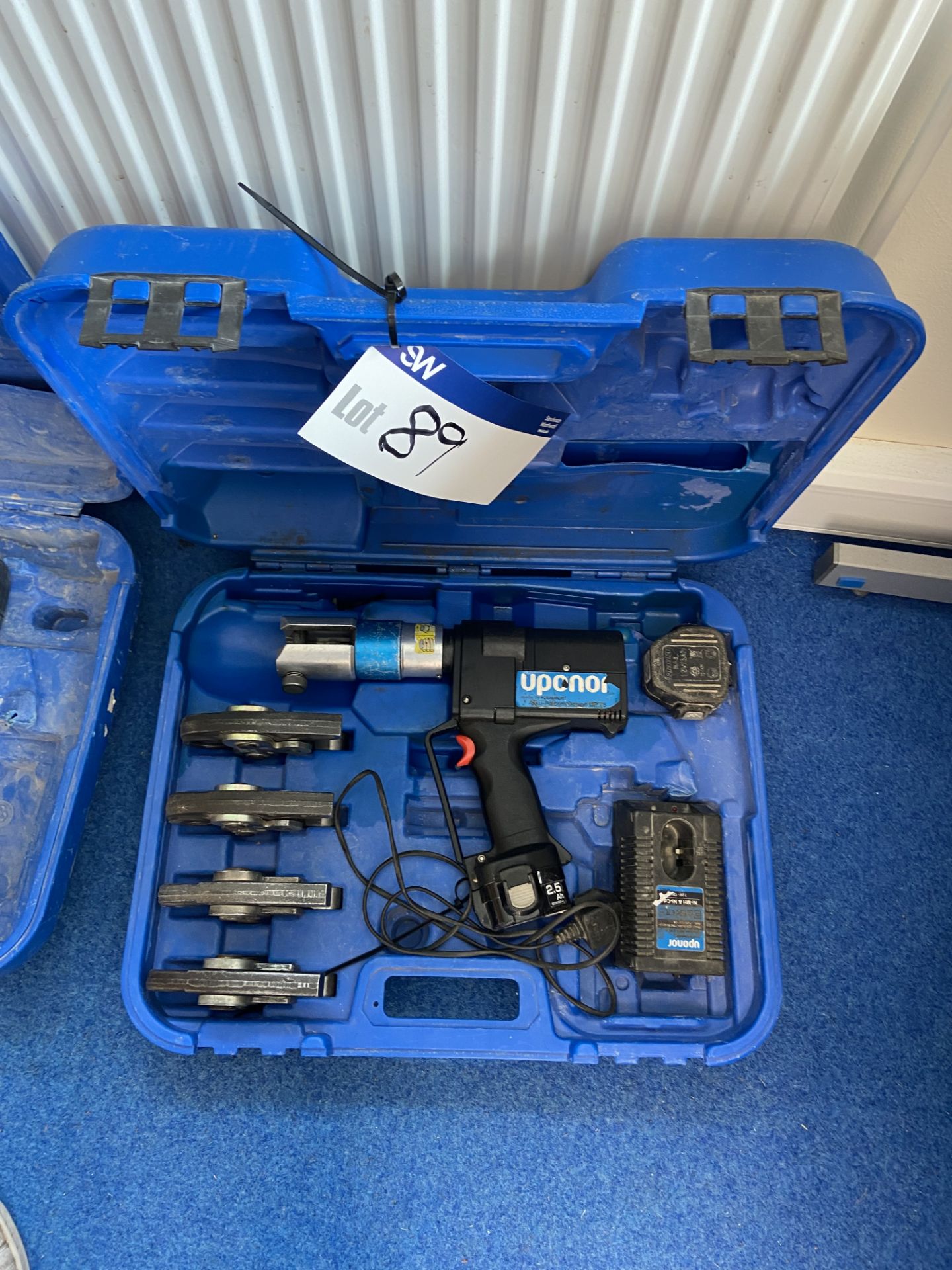 Uponor UP75 Press Tool, with spare battery, charger, tooling and carry casePlease read the following