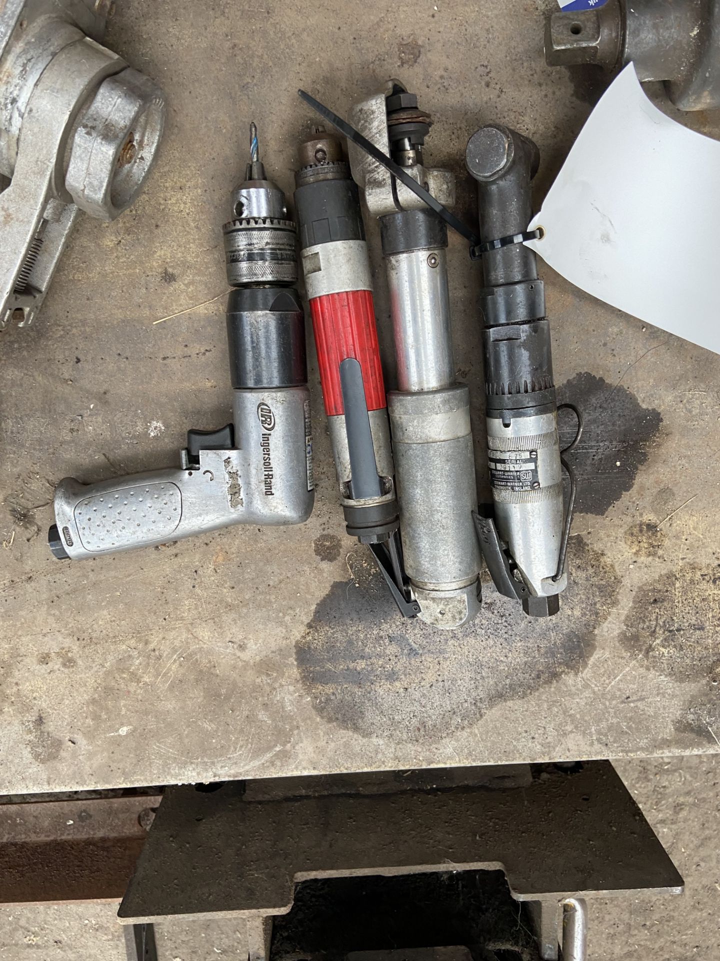 Four Assorted Pneumatic Hand Tools, including drill and grinder Note:- VAT will not be charged on