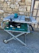 Makita 2704 Site Saw, on a wheeled trolly, 110V (vendors comments - good condition), lot