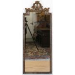 Spiegel im Empirestil, Holz, bronziert, florale Bekrönung beschädigt, Gebrauchspuren, 147x57x4 cm