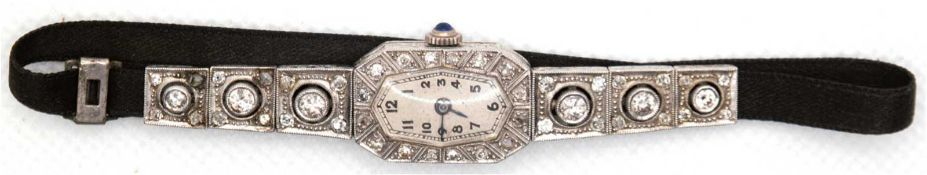 Art-Deco-Uhr, Platin, Brillanten ca. 1,2 ct. und Diamanten ca. 1,0 ct., Krone besetzt mit Saphircab