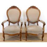 Paar Louis-Philippe-Sessel, Mahagoni, gepolsterter Sitz und Rückenlehne mit geschnitzter Bekrönung,