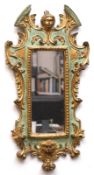 Spiegel im Barockstil, reich figürlich und floral verzierter Rahmen gold und grün gefaßt, 3 Risse, 