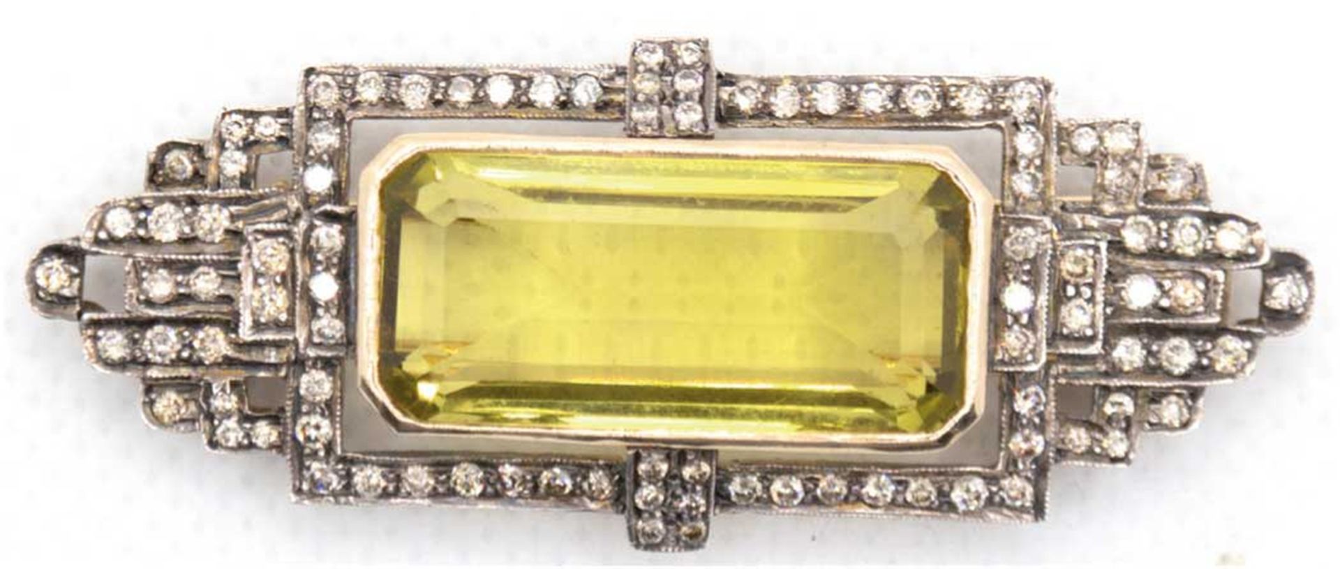 Brosche im Art-Deco-Design, 750er GG, 12,9 g, großer Topas von 18,8 ct., Brillanten zus. 1,11 ct., 