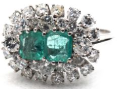 Ring, WG 750, 7,3 gr., 2 Smaragde zus. ca. 2,5 ct., 1x min. Chip, Brillanten ca. 3,2 ct., RG 59, In