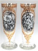 Paar Stangengläser, in goldgerahmter Kartusche Schwarzlotmalerei auf weißem Grund, Golddekor, H. 24