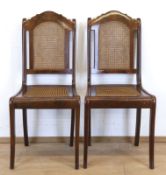 Paar Biedermeier-Stühle, Mahagoni, Sitz und Rückenlehne mit Rohrgeflecht (intakt), 99x45x49 cm