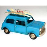 Modellauto "Morris-Cooper mit 2 Surfbrettern", 1970er Jahre, Metall, hellblau, 13,5x24x12 cm