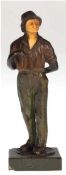 Figur "Herr mit Hut", Bronze, Gesicht aus Bein geschnitzt, Hut am Rand best., auf einem runden reli