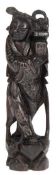 Stehende Figur, 19. /20. Jh., China, Holz geschnitzt, auf Postament, Gewand mit Silberinlay, H. 25,
