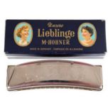 M. Hohner-Mundharmonika "Unsere Lieblinge", im Original- Etui, Gebrauchspuren, L. 13,5 cm