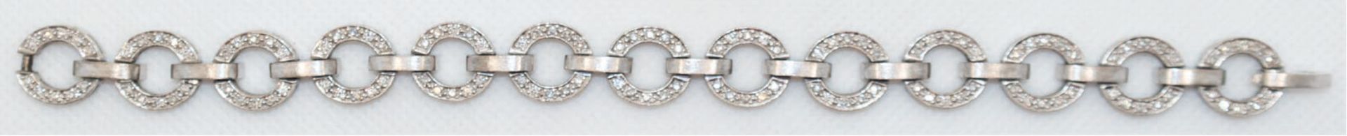 Chopard-Brillant-Armband, 750er WG, 48,25 g, 13 ringförmige Glieder ausgefaßt mit je 10 Brillanten,