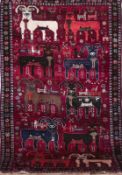 Gabbeh, rotgrundig mit Tiermotiven, Gebrauchspuren, 200x125 cm