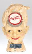 Spardose "Coca Cola Sprite Boy", 40/50er Jahre, Gußeisen, polychrome Bemalung, Gebrauchspuren, H. 1