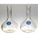 2 Vasen, farbloses Glas, gebauchte Form, mit blauem Siegel, Gebrauchspuren, H. 23 cm