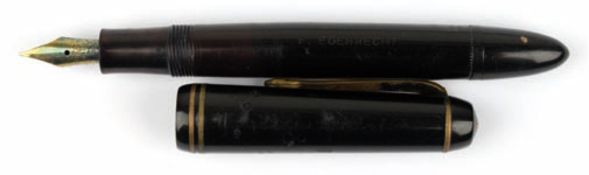 Kolbenfüller "Kaweco Dia 802 A", 1. H., 20. Jh., schwarz, wohl 14 kt Goldfeder, Gebrauchspuren, Kap