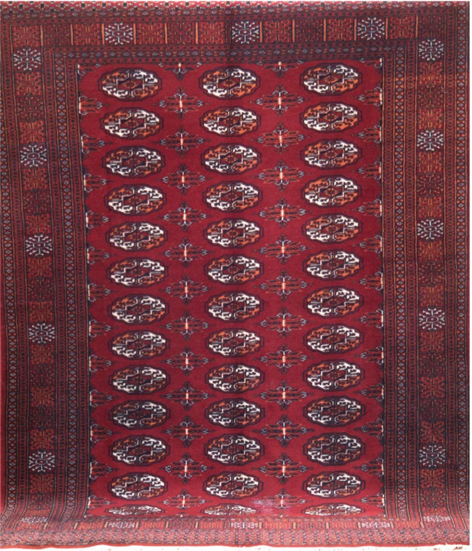 Teppich, Pakistan, 185x126 cm, rotgrundig mit zentralem Muster, Fransen gekürzt, mittig belaufen