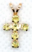 Kleines Kreuz, GG 10 kt./ 416er, Peridot ,0,43 ct., Maße ca. 1,6 x 0,8 cm