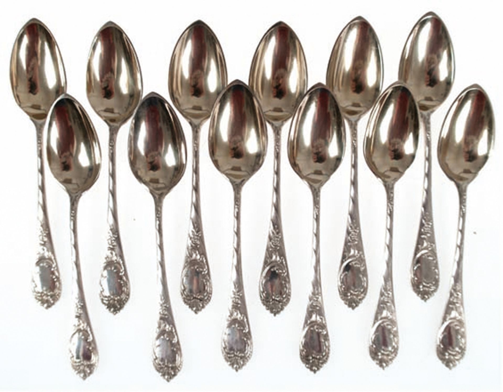 18 Kaffeelöffel, 800er Silber, punziert, 142 g, Griff mit Reliefdekor und Kartusche, L. 11 cm