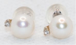 Ohrstecker, WG 14 kt., Perlen ca. 6-6,5 mm, Brillanten, Aufstecker aus Silikon mit Goldinlay