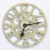 Wanduhr, Eisenguß, weiß gefaßt, stilisierte Zahnräder einer Uhr, ohne Werk, Dm. 49 cm