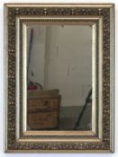 Spiegel, um 1900, Holz mit floralen Stuckverzierungen, bronziert, 78x57x6 cm