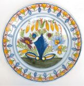 Teller, Fayence, Kellinghusen 19. Jh., im Spiegel florale Malerei, Fahne mit ornamentaler Malerei, 