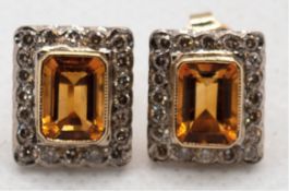 Ohrstecker, 750er GG, rechteckige Citrine zus. 1,85 ct., Brillanten 0,60 ct., 4,8 g, Maße ca. 1,2 x