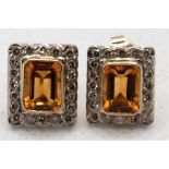 Ohrstecker, 750er GG, rechteckige Citrine zus. 1,85 ct., Brillanten 0,60 ct., 4,8 g, Maße ca. 1,2 x