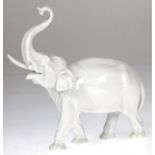 Meissen-Figur "Elefant", weiß, 1. Wahl, 1 Stoßzahn geklebt und bestoßen, 17x18x6 cm