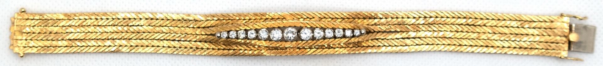 Brillant-Armband, 750er GG, in Reihe besetzt mit 13 Brillanten vsi, von zus. ca. 1,4 ct., in Krappe