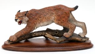 Granget, Gunther  (1932-2010) "Luchs", Holz geschnitzt, polychrom staffiert, auf ovaler Holzplinthe