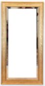 Spiegel, mit Facettenschliff, figürlich reliefierte Rahmenleiste, ges. 148x72 cm