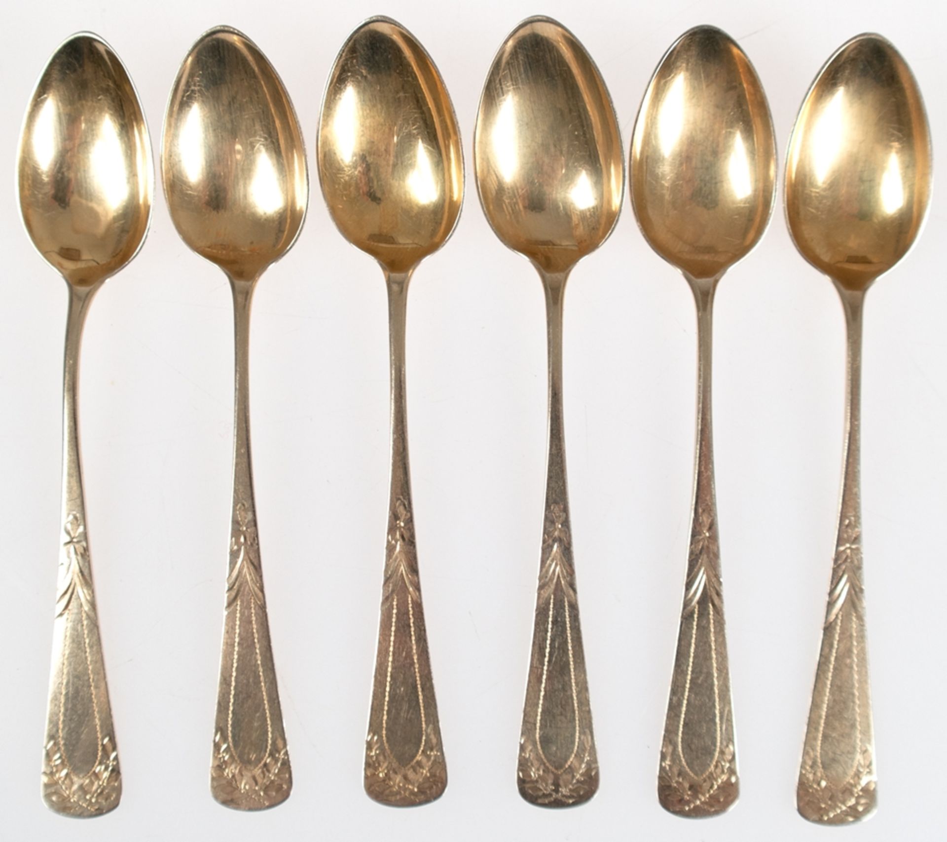 6 Kaffeelöffel, um 1900, 800er Silber, Laffe vergoldet, floral reliefiert, zus. 63 g, L. 14,4 cm